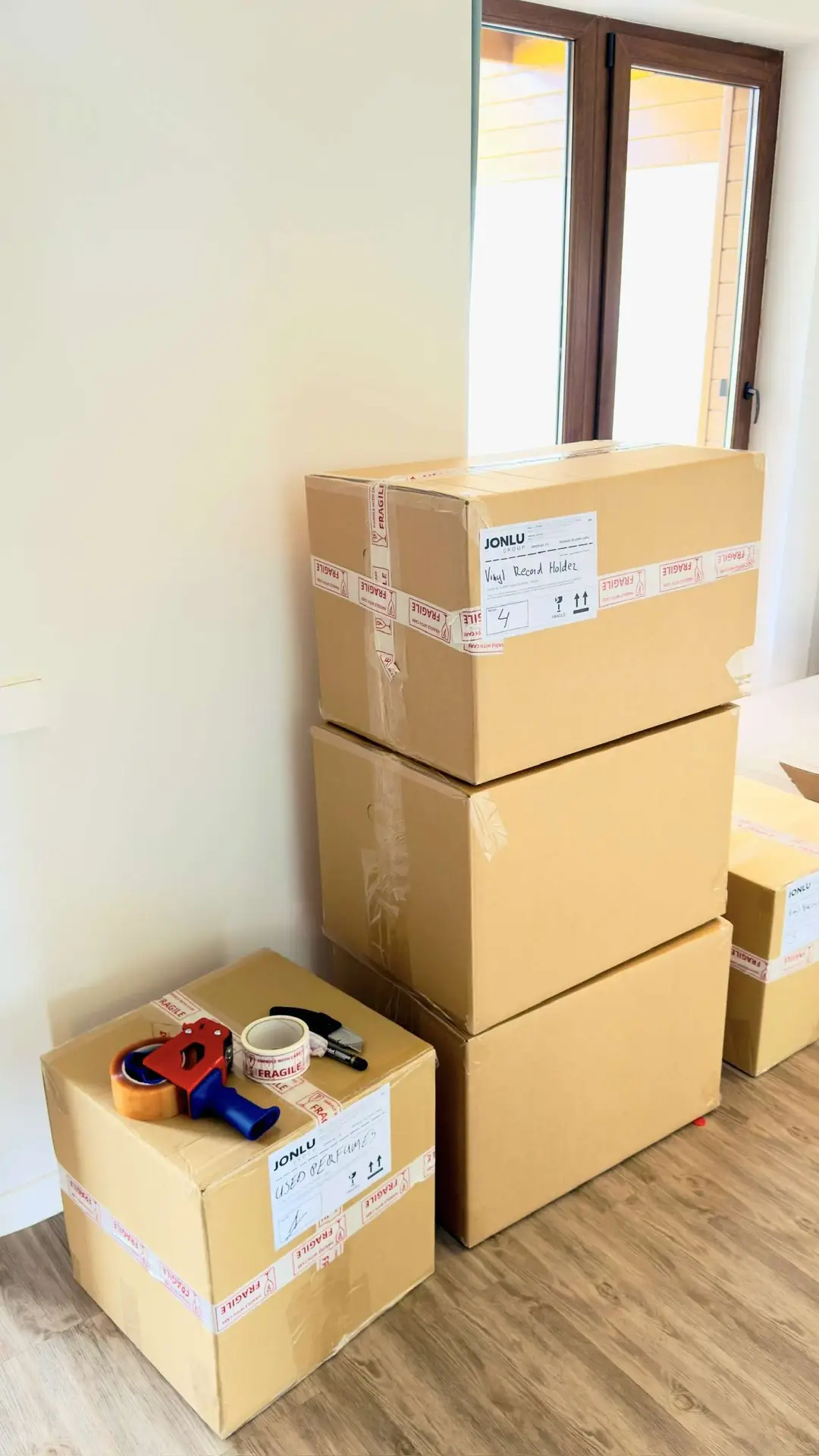 International moving company in Lithuania performing a packing job